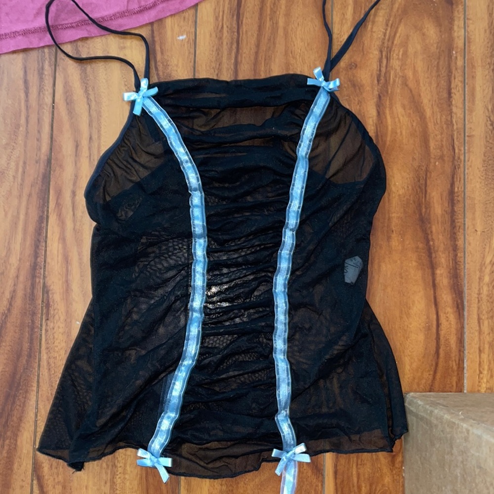 Black mesh top with blue bows